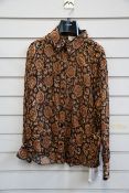 An as new women's Celine Paris silk shirt in black and orange (Size 40 - RRP £558).