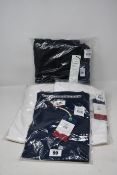 An as new Tommy Jeans Small Flag hoodie (L) and three Tommy Jeans T-shirts (L).