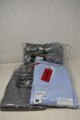 An as new Hugo Boss polo shirt, sweatshirt and sweatpants (All XL).