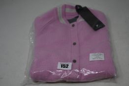 An as new Zoe Jordan Mini Edison cashmere bomber in pink (4-5 years - RRP £135).