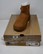 A pair of as new Ugg Mini Bailey Button boots (UK 6).