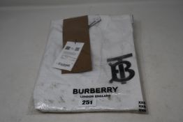 An as new Burberry Atherton long sleeved monogramed top in white (XXS - RRP £370 - Please note