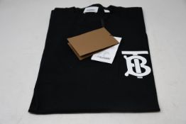 An as new Burberry Atherton long sleeved monogramed top in black (XXS - RRP £370 - Please note