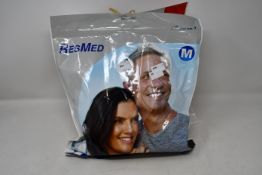 A sealed as new ResMed Mirage Quattro medium full face mask and a ResMed AirFit F30 mask system.