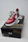 A pair of as new Nike Air Force 1 High '07 LV8 Nordic Christmas Red White sneakers (UK 9).