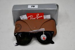A pair of as new Ray Ban sunglasses.