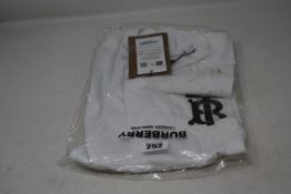 An as new Burberry Atherton long sleeved monogramed top in white (M - RRP £370 - Please note item
