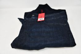 An as new Hugo Boss quarter zip sweatshirt (L) together with a pair of Hugo Boss jeans (W38/L30).