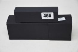 An as new boxed Daniel Wellington Classic York black face watch with dark brown strap, a boxed as