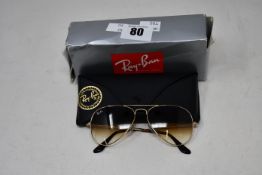A pair of as new Ray Ban sunglasses.