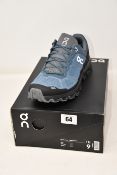 A pair of as new On Running Cloudventure trainers (UK 8.5).