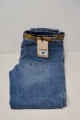 A pair of as new Roberto Cavalli skinny fit five pocket jeans (TG 44).