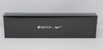 A boxed as new Apple Watch Nike SE (GPS + Cellular, 44mm) Silver Aluminium Case with Pure Platinum/