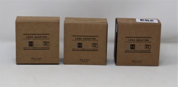 Three boxed as new Fikaz Lens Adaptors; 1 x Nikon to Canon EOS R, 1 x Canon EOS to Nikon Z, 1 x