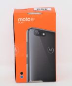 A boxed as new Motorola E6 Play XT2029-2 32GB Dual Sim Smartphone in Steel Black (Box sealed. UK