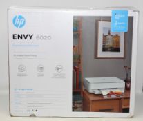 A boxed as new HP Envy 6020 All in One Wireless Printer (P/N: 5SE16B BHC) (Box opened, some damage
