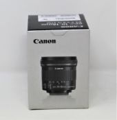 A boxed as new Canon EF-S 10-18mm f/4.5-5.6 IS STM Lens (P/N: 9519B005AA) (Box opened).