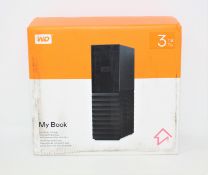 A boxed as new Western Digital My Book 3TB Desktop Hard Drive (Box sealed).