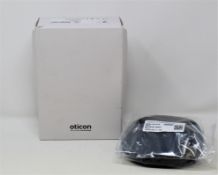 A boxed as new Oticon Charger 1.0 miniRITE R in Black for Oticon More, OPN & Ruby hearing aids (