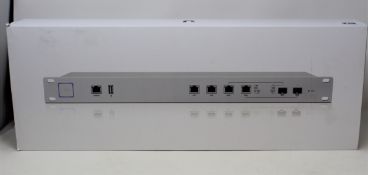 A boxed as new Ubiquiti UniFi Security Gateway Pro Enterprise Gateway Router with 2 Combination