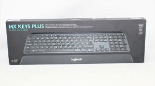 A boxed as new Logitech MX Keys Plus Wireless Keyboard in Graphite (P/N: 920-009414) (Box sealed).
