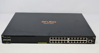 A boxed as new HPE Aruba JL261-61002 24-Port Rack-Mountable 1U Network Switch (UK plug adaptor