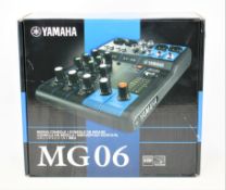 A boxed as new Yamaha MG-06 6-Channel Mixing Console (M/N: ZT41540) (Box opened, UK plug).