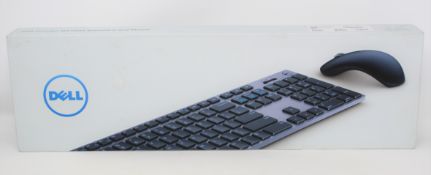 A boxed as new Dell Premier Wireless Keyboard and Mouse (P/N: 0NJWTK VPN:KM717-GY-UK) (Box sealed,