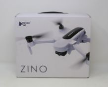 A boxed as new Hubsan Zino Folding Quadcopter Drone (UK plug adapter required).