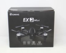 A boxed as new Eachine EX2 Mini Quadcopter Drone (UK plug adaptor required).