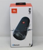A boxed as new JBL Flip 5 Waterproof Portable Bluetooth Speaker in Blue (Box sealed, ssome damage to