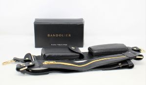 An as new Bandolier Billie Crossbody Utility Strap in Black/Gold (Strap only, phone case not