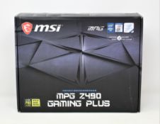 A boxed as new MSI MPG Z490 GAMING PLUS ATX Gaming Motherboard (P/N: 911-7C75-015) (Box opened).