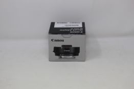 A boxed as new Canon EF-EOS M Mount Adapter (P/N: 6098B005AA) (Box sealed).