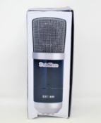 A boxed as new SubZero SZC-400 Condenser Microphone (Damaged box).