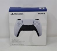 A boxed as new Sony DualSense PS5 Wireless Controller in White (Box sealed).