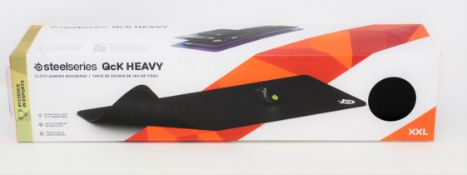 A boxed as new SteelSeries QcK XXL Cloth Gaming Mouse Pad (Box sealed, some damage to box).