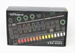 A boxed as new Roland TR-6S Rhythm Performer Drum Machine (Box sealed).