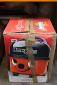 A boxed as new Henry Xtra hoover.