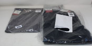 A pair of Tommy Jeans mid rise straight leg jeans (W30/L30) and two Tommy Jeans T-shirts (XS, S).
