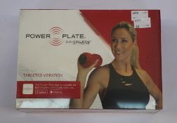 A boxed as new Power Plate dual sphere vibration roller in Red.