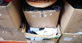 Seven boxes of assorted clothing and related items.