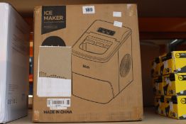 A boxed Ikich CP173A Portable Ice Maker.