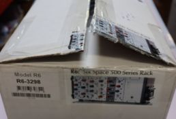 A boxed as new Rupert Neve Designs R6 six-space 500 series rack (R6-3298).