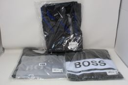 An as new Hugo Boss T-shirt, sweatshirt and sweatpants (All L).
