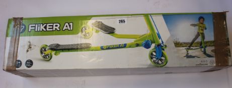 A boxed Fliker A1 Kids Scooter in green.