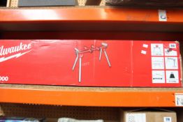 A boxed Milwaukee MSL 1000 Universal Mitre Saw Leg Stand.