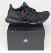 A pair of as new Adidas Ultra Boost trainers (UK 8).