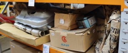 A quantity of assorted car parts and a box of car keys.