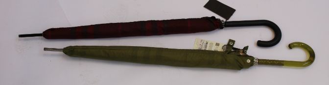 Five as new Burberry umbrellas.